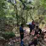 People enjoying a rest break on Skeleton Gorge